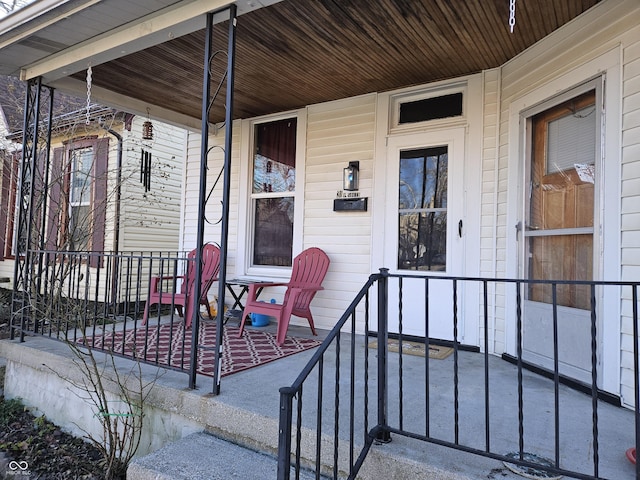 entrance to property featuring a porch