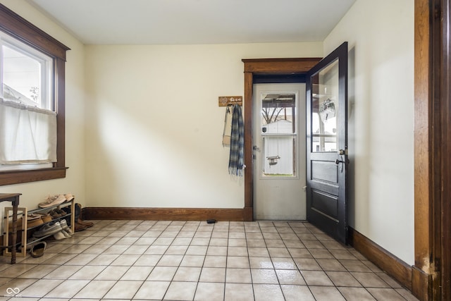 view of tiled foyer entrance