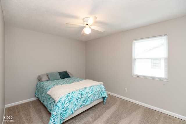 bedroom with carpet and ceiling fan