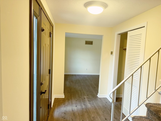 hall featuring dark hardwood / wood-style flooring