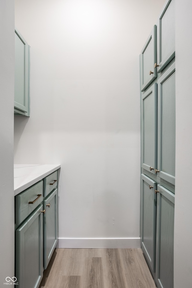 interior space featuring hardwood / wood-style floors and vanity