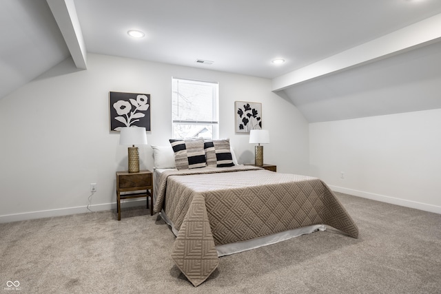 bedroom with carpet flooring and lofted ceiling with beams