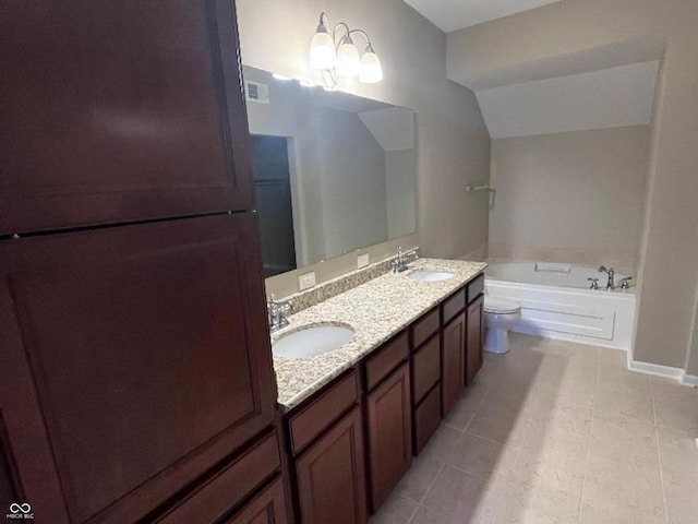 bathroom with vanity, a bath, tile patterned floors, vaulted ceiling, and a notable chandelier