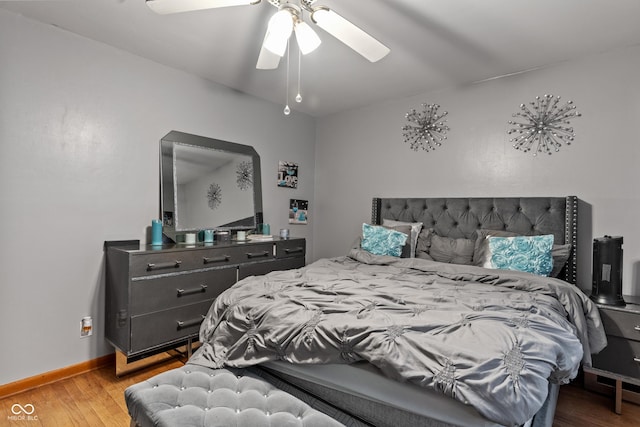 bedroom featuring ceiling fan and light hardwood / wood-style floors