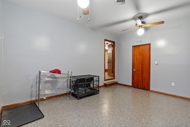 unfurnished room with ceiling fan