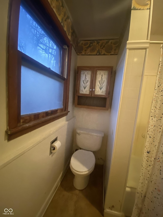 bathroom featuring toilet