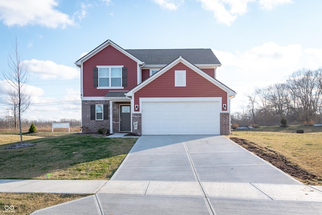 view of front of home with a front yard and a garage