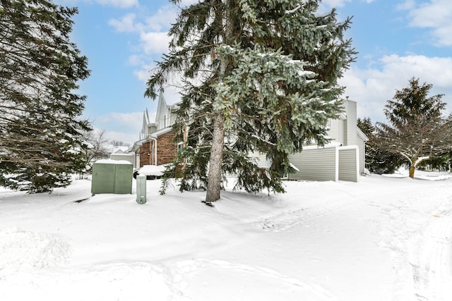 view of snow covered property