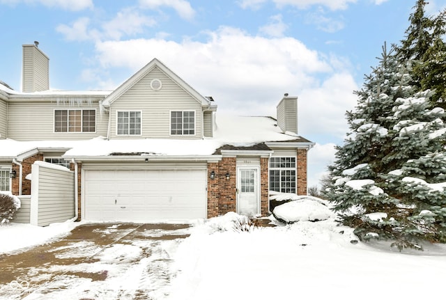 view of front of home with a garage