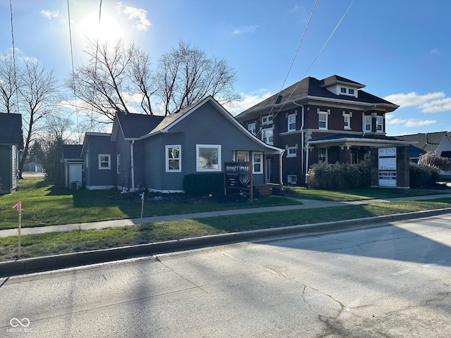 view of front of home with a front yard