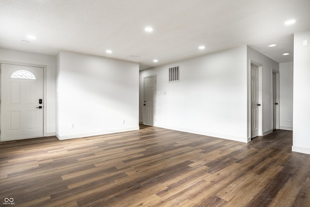 interior space featuring dark wood-type flooring