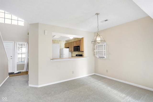 interior space with light colored carpet