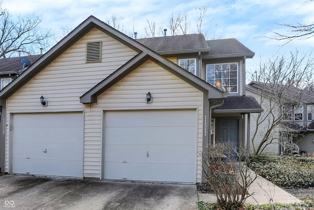 view of front of property featuring a garage