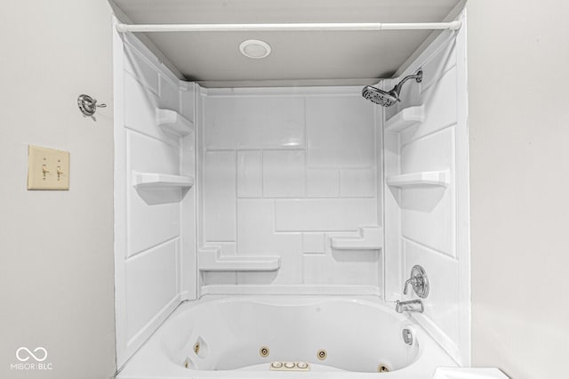 bathroom with shower / washtub combination