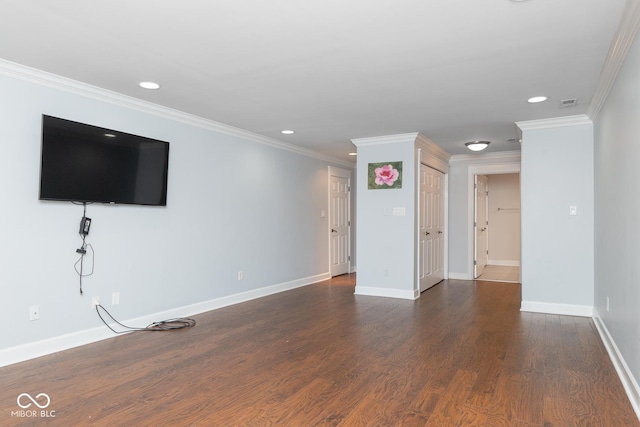 unfurnished living room featuring crown molding and dark hardwood / wood-style floors