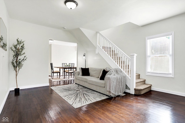 living room with dark hardwood / wood-style floors