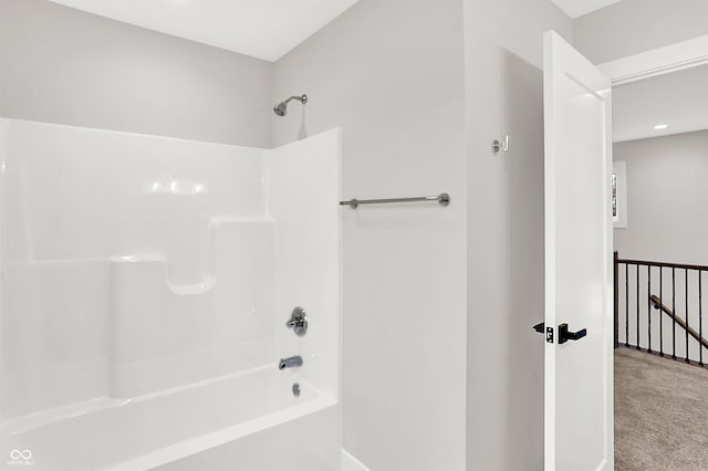 bathroom featuring  shower combination