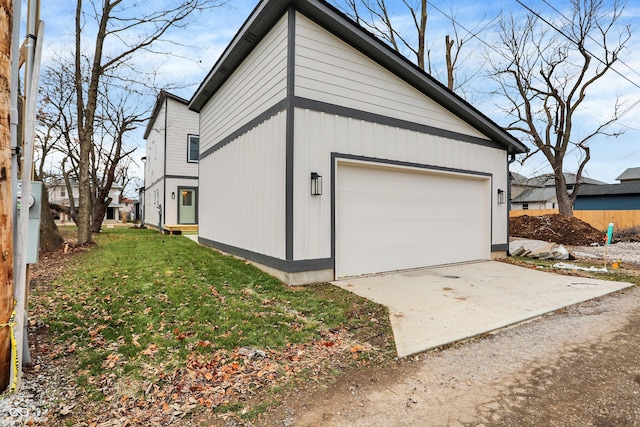 garage featuring a yard