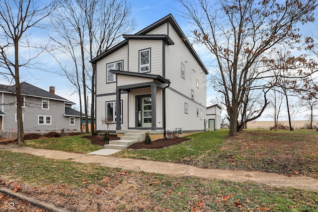 view of front of house with a front yard