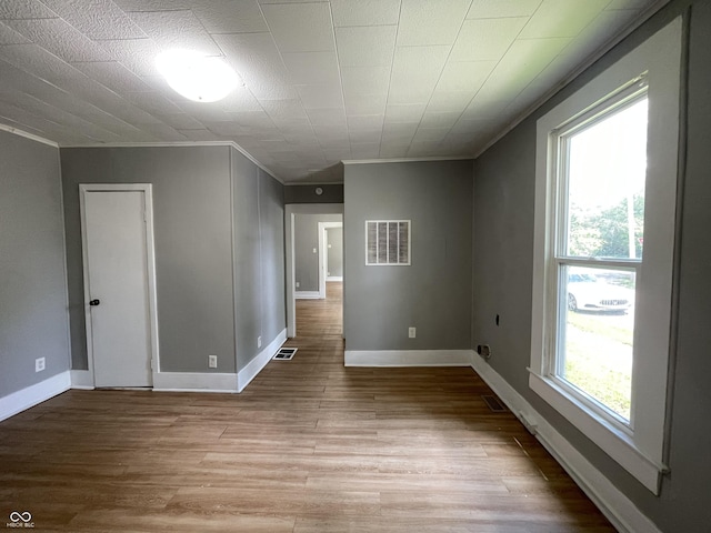 spare room featuring light hardwood / wood-style flooring