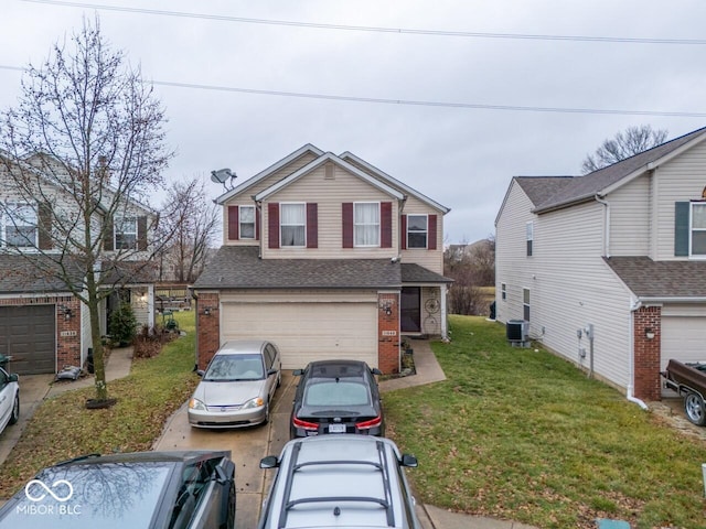 view of property with cooling unit, a garage, and a front yard