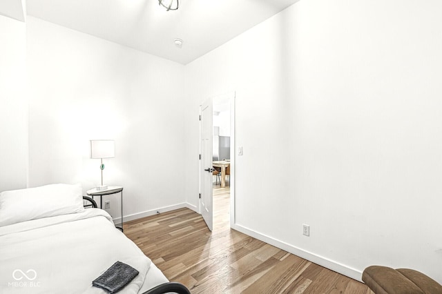 bedroom featuring hardwood / wood-style flooring