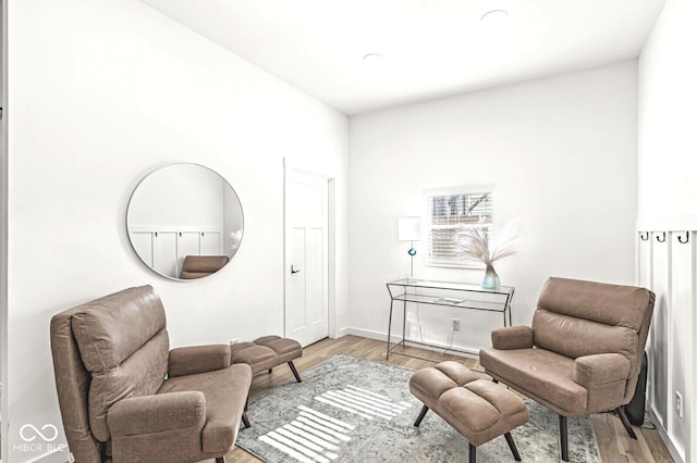 sitting room featuring light hardwood / wood-style floors