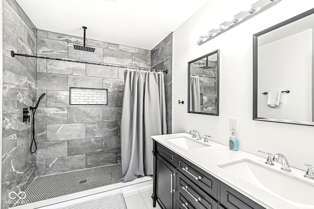 bathroom featuring tile patterned flooring, vanity, and a shower with shower curtain