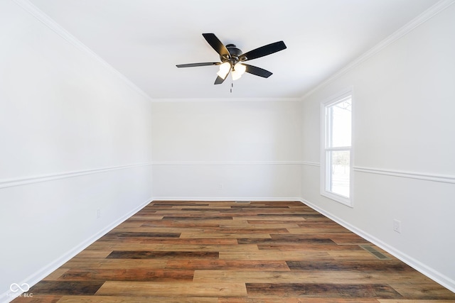 empty room with dark wood-type flooring, ornamental molding, and ceiling fan