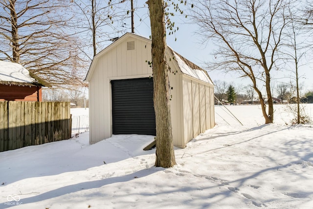 view of snow covered garage