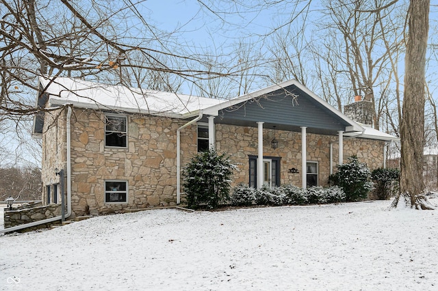 view of snow covered property