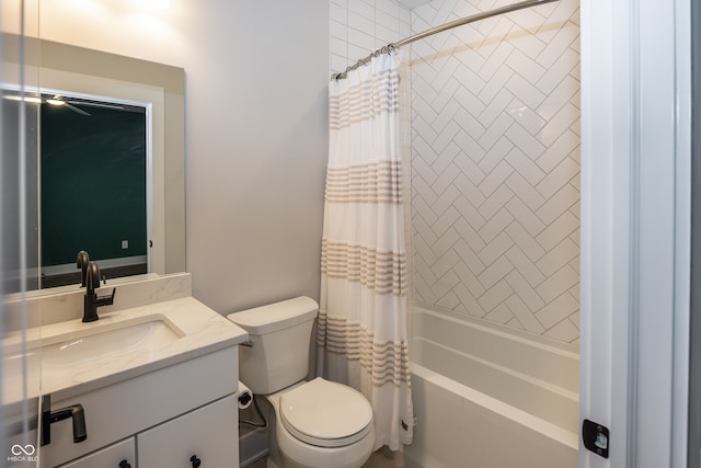 full bathroom with shower / bathtub combination with curtain, vanity, and toilet