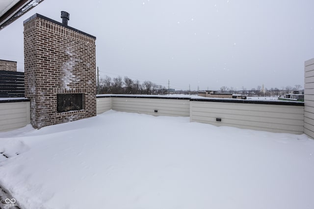 view of yard layered in snow