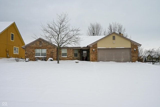 ranch-style home featuring a garage