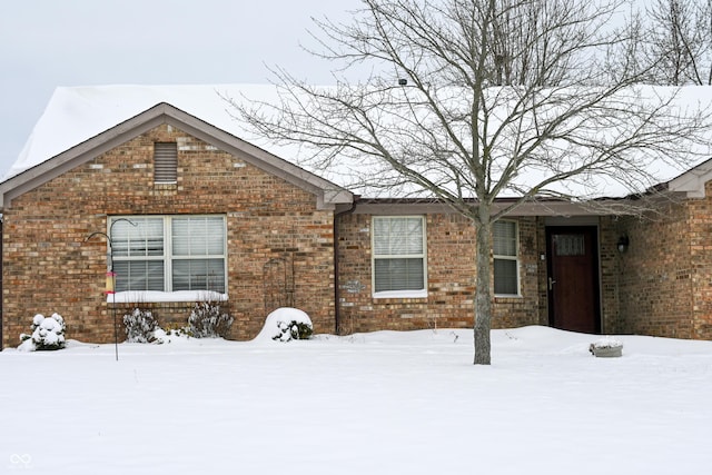 view of snow covered property