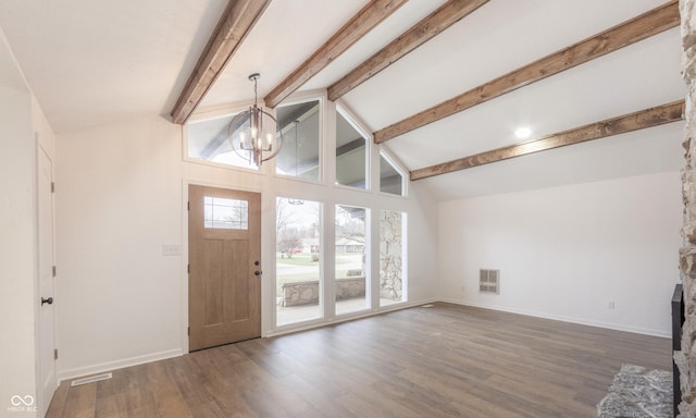 entryway featuring a chandelier, beam ceiling, high vaulted ceiling, and dark wood-type flooring