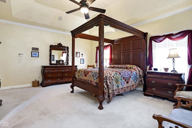 carpeted bedroom featuring ceiling fan and ornamental molding