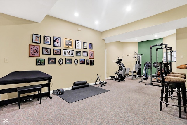 exercise room featuring carpet