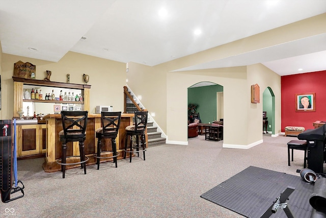 1398 Penny Ln, Greenfield, IN 46140 - indoor bar with arched walkways, stairway, carpet flooring, and recessed lighting