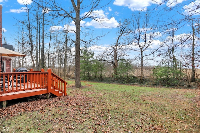 view of yard featuring a deck