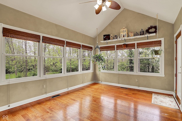 unfurnished sunroom with visible vents