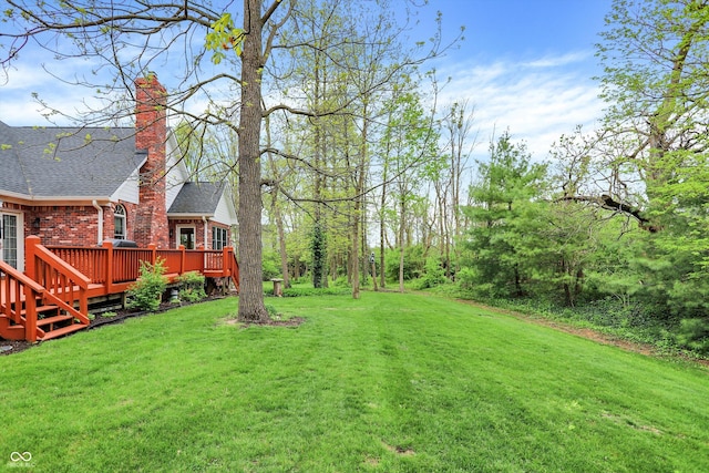 view of yard with a deck