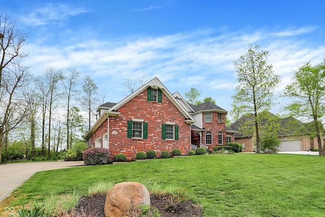 view of front of house with brick siding, a front yard, and a garage