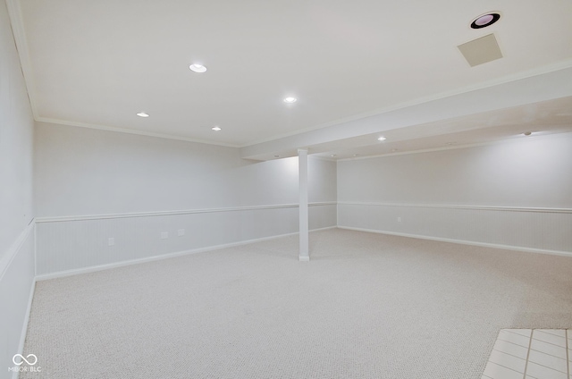 carpeted empty room with ornamental molding