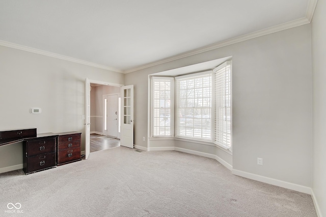 carpeted empty room with ornamental molding