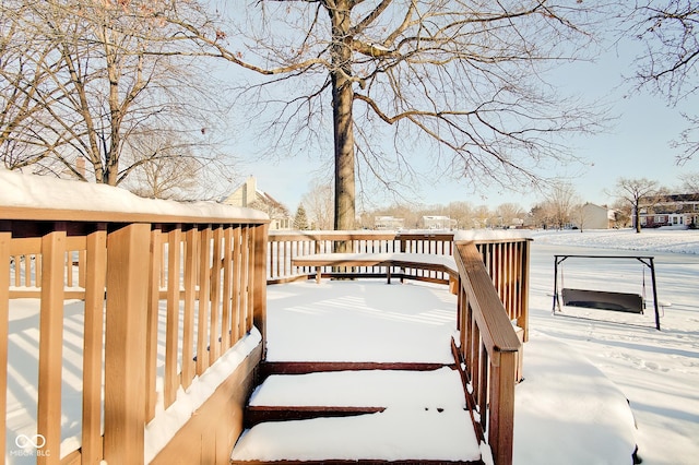 view of snow covered deck