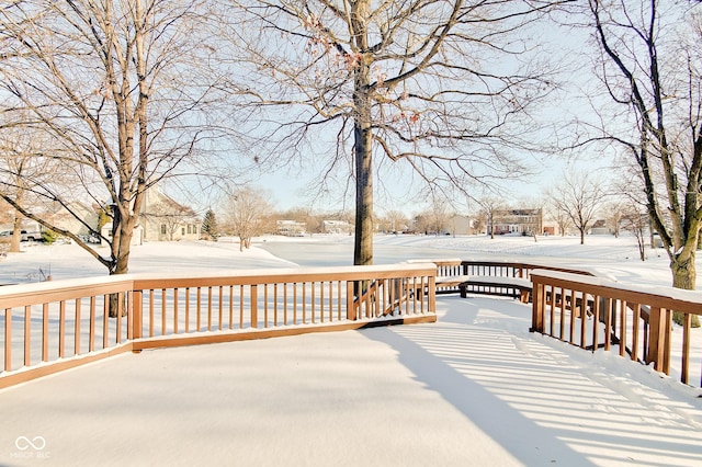 view of snow covered deck