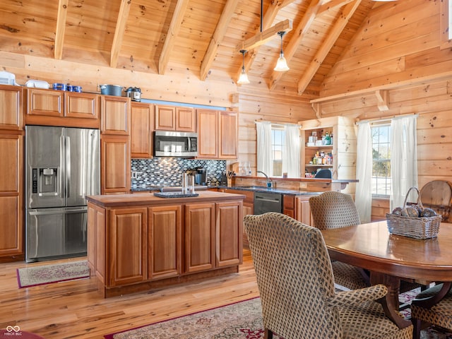 kitchen featuring a kitchen island, light hardwood / wood-style floors, wood ceiling, stainless steel appliances, and beam ceiling