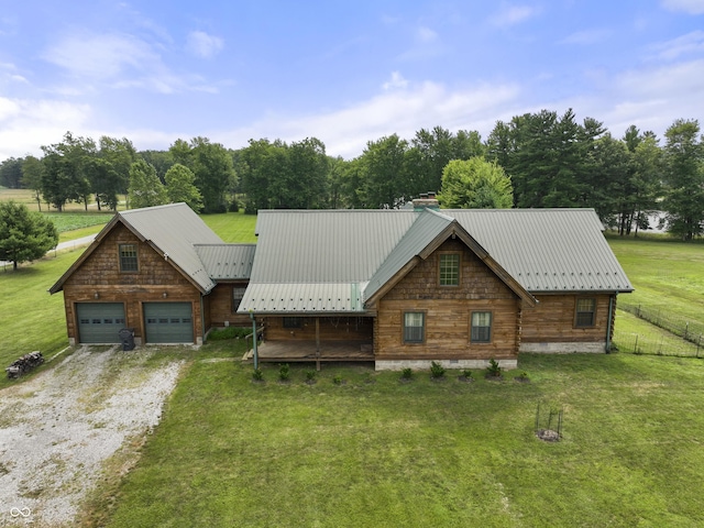 4210 S County Road 400 E, North Vernon, IN 47265 - log home with a chimney, driveway, and a metal roof