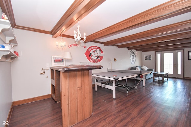 rec room featuring a notable chandelier, beam ceiling, dark hardwood / wood-style flooring, and crown molding